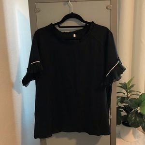 Black blouse with ruffle sleeves